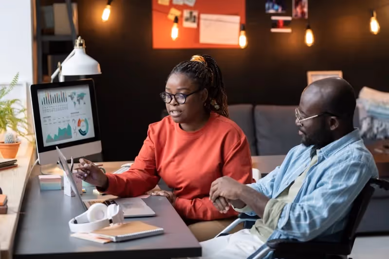 Cloud migration engineers discussing an application migration process