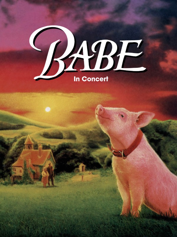 Babe In Concert poster: Babe the pig on a green hill at sunset