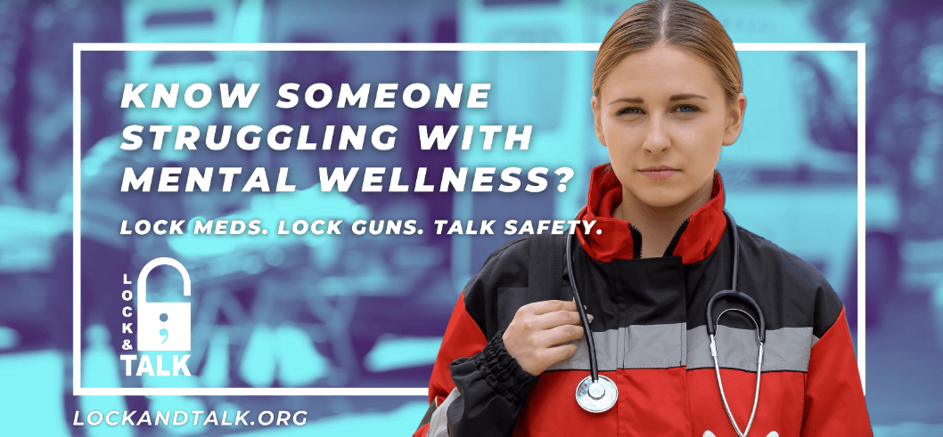 Paramedic posing for camera, ambulance crew transporting patient on background