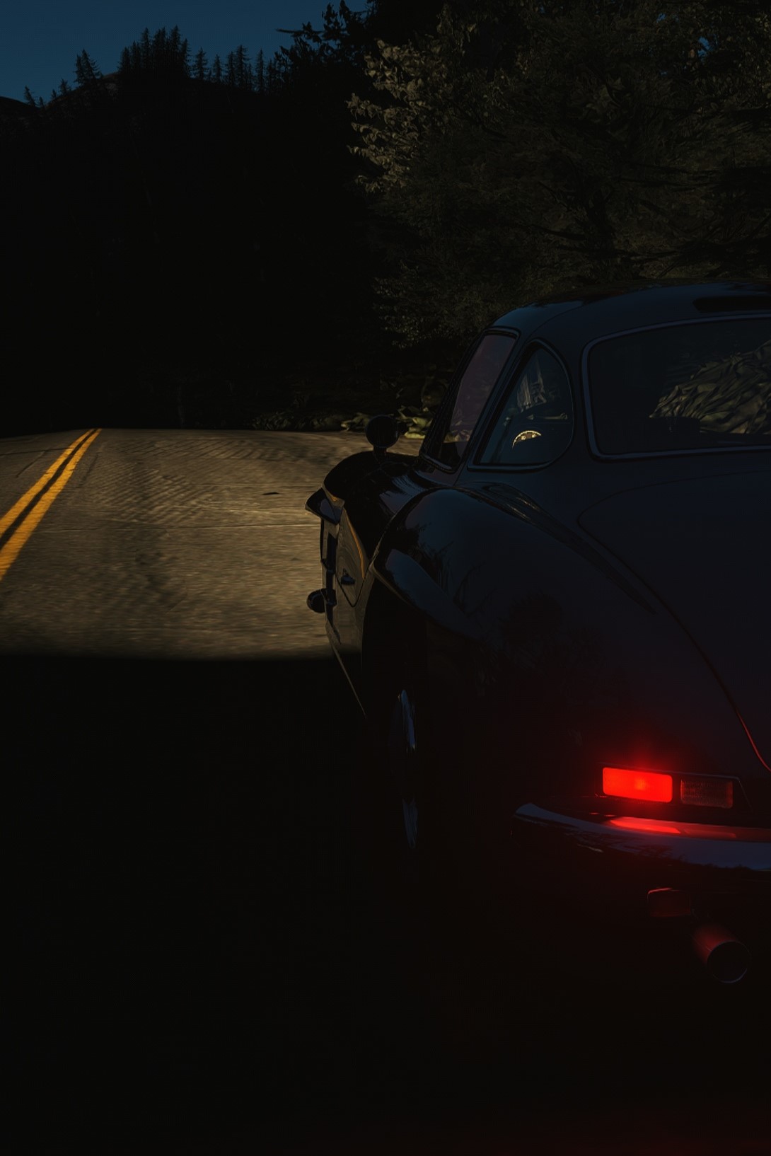 A screenshot of a Mercedes-Benz 300SL converted for Assetto Corsa by Buja Gili with its headlights shining on Alpine Meadows Rd by Real Sim Roads at dusk.