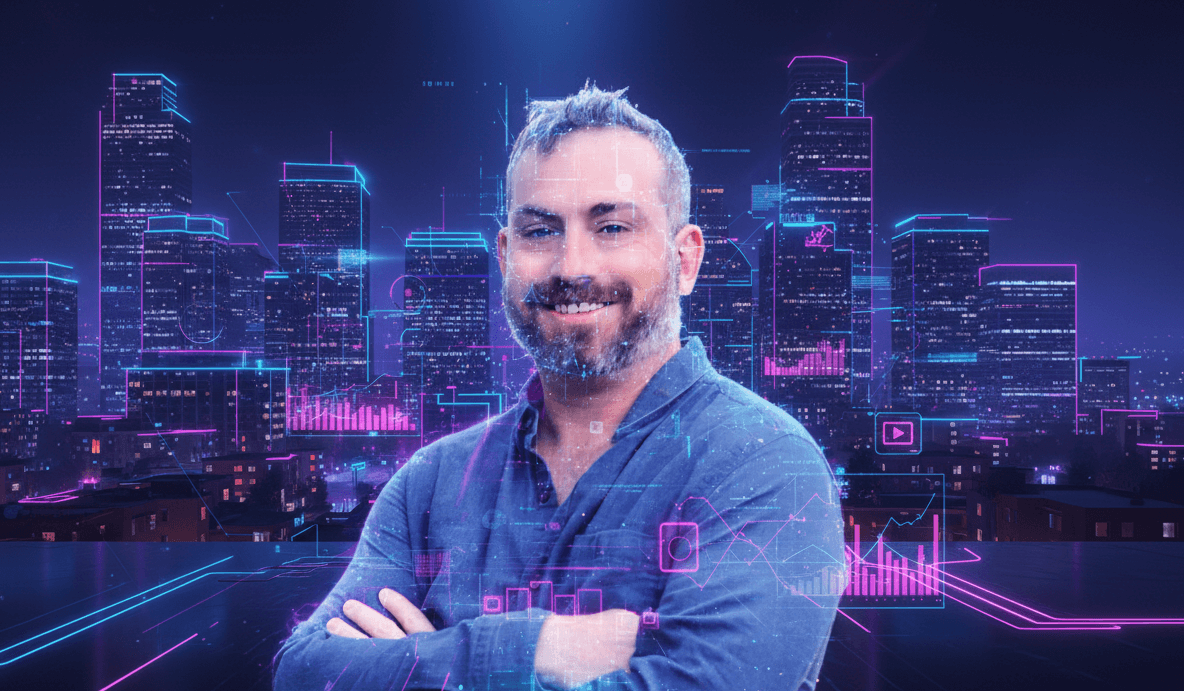 A man with short hair and a beard, smiling with arms crossed, stands in front of a futuristic digital cityscape. The background shows tall skyscrapers outlined in neon pink and blue lights, with glowing data visualizations, charts, and tech-style graphics layered across the scene, giving a cyberpunk and high-tech aesthetic.