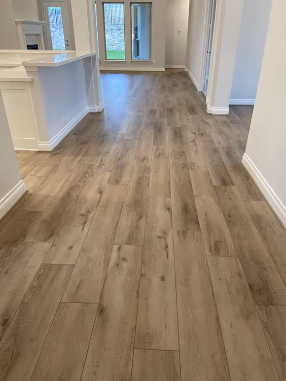 Luxury vinyl plank flooring installation in an entryway