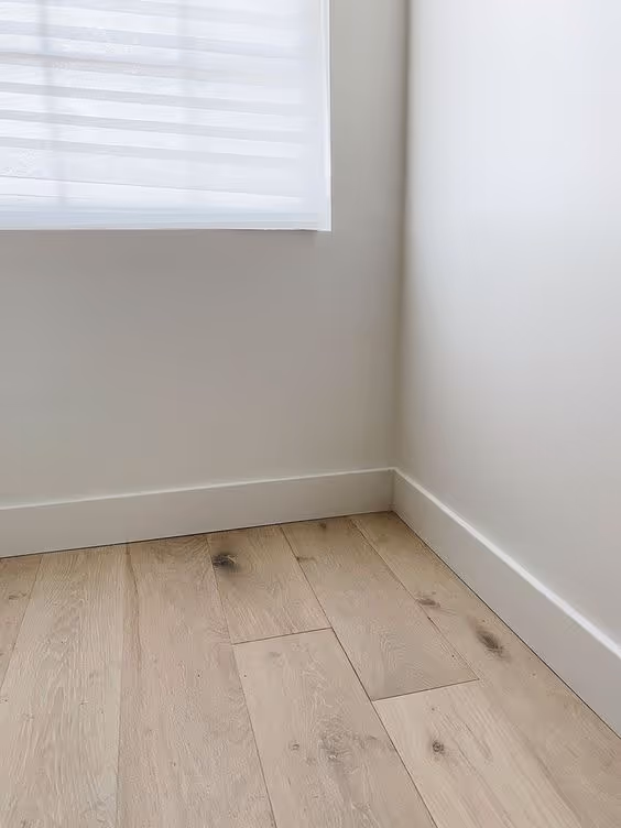 Wood-look vinyl plank flooring in a bedroom