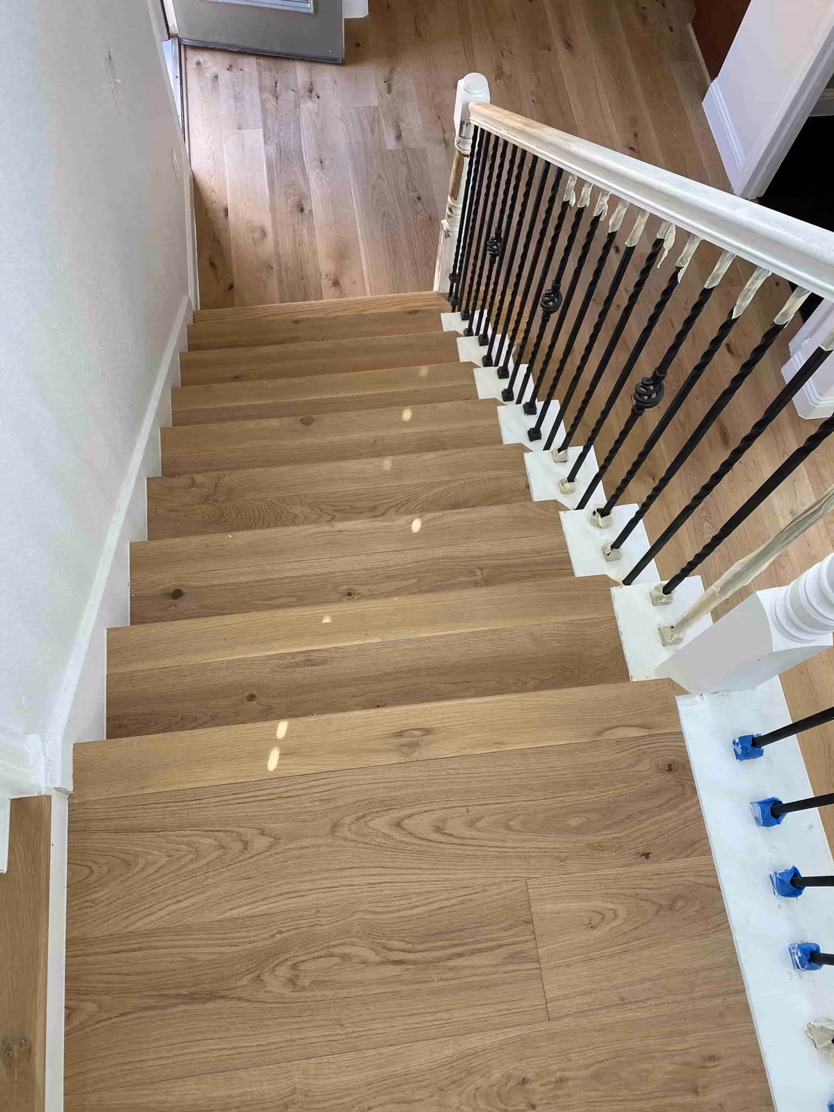 Stair installation with white oak engineered hardwood – Kirkland, WA, 2026