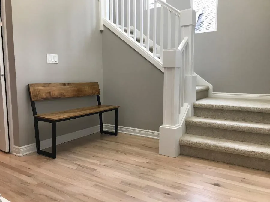 Light natural finished floor at a stair landing