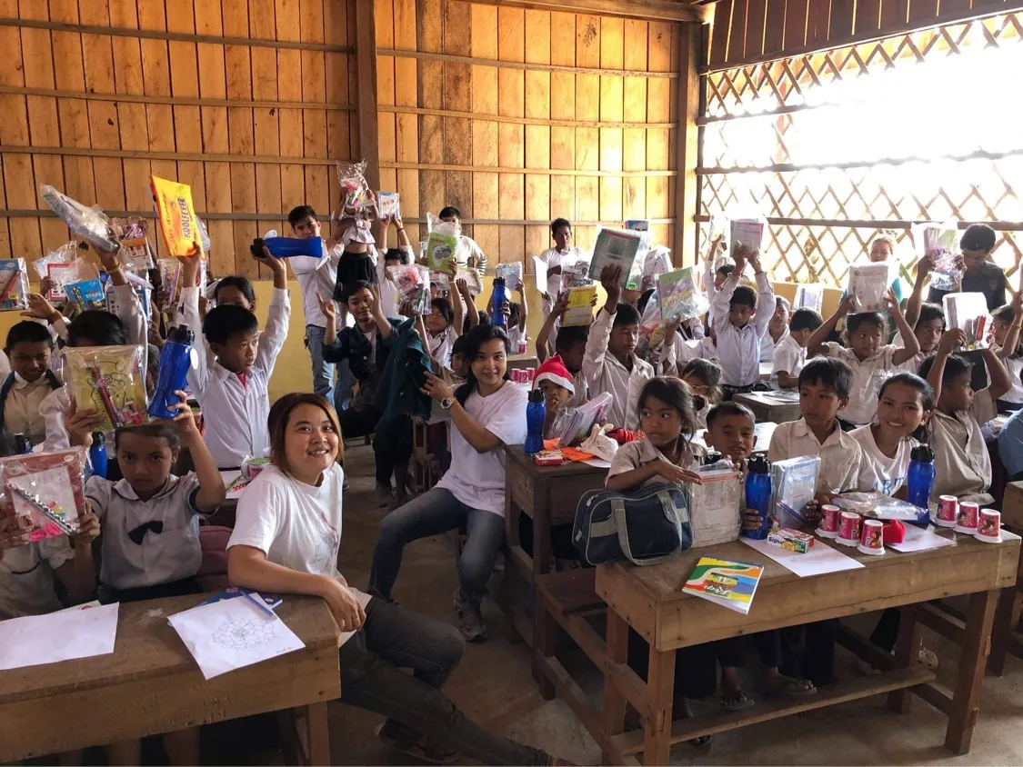 Kids in art class excited to have their picture taken.