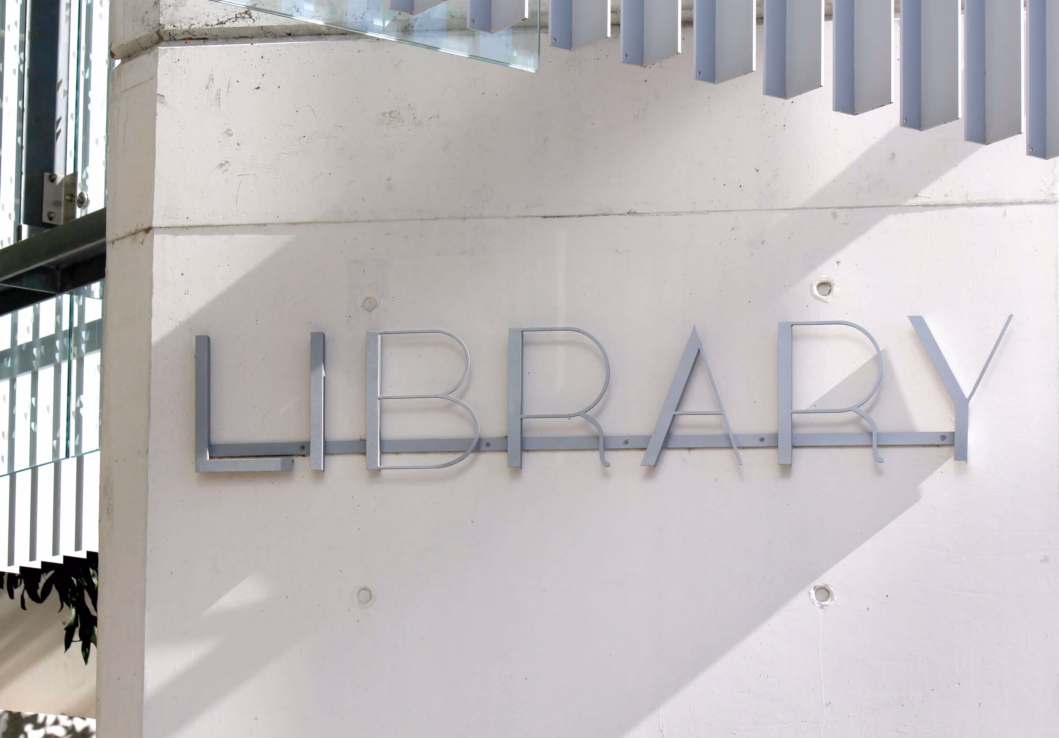 Close up of a library sign