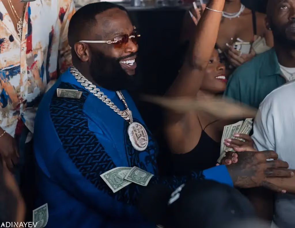 Rick Ross celebrating an album release party at E11EVEN