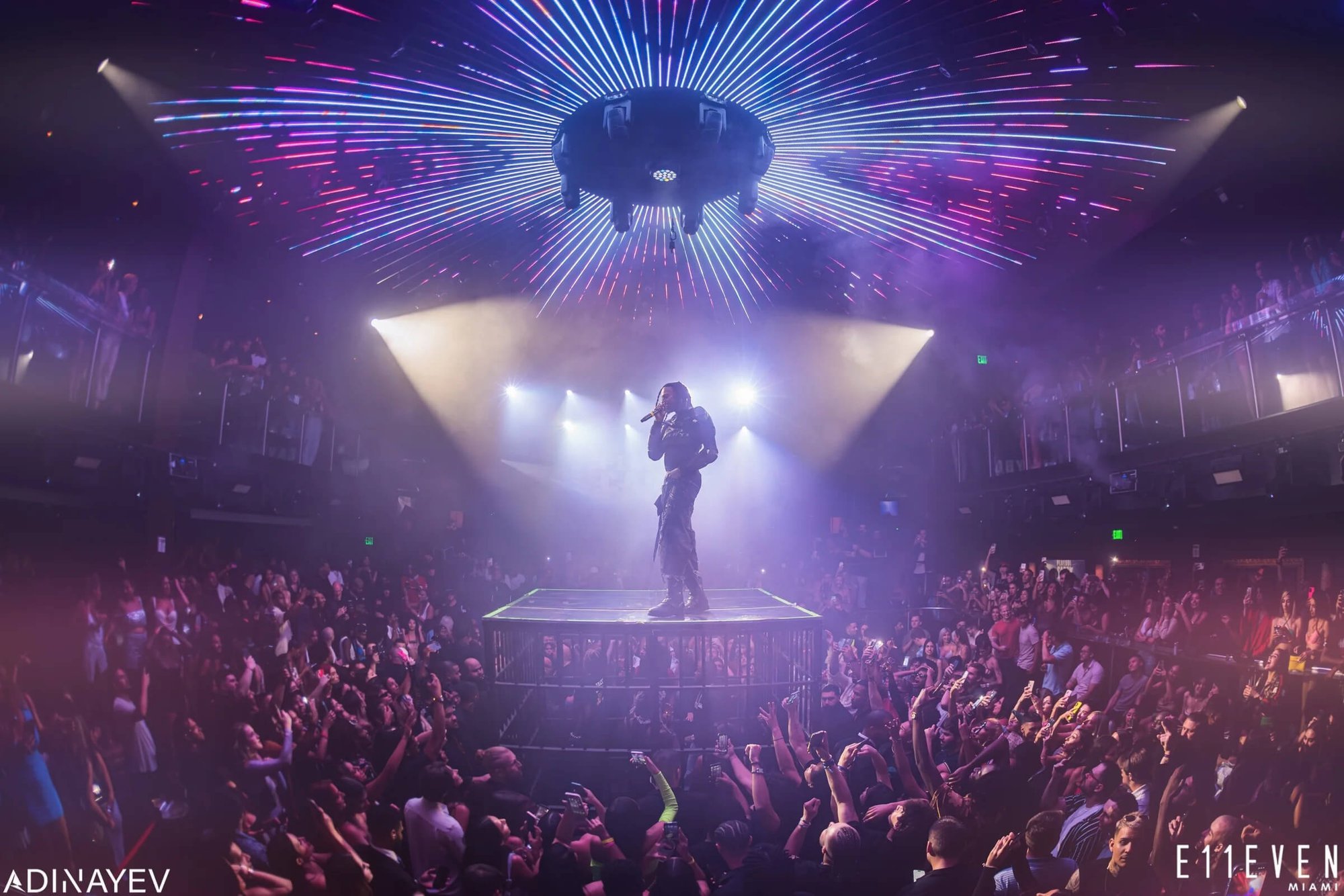 Playboi Carti performing on top of a cage at E11EVEN Miami for Rolling Loud afterparty 2023