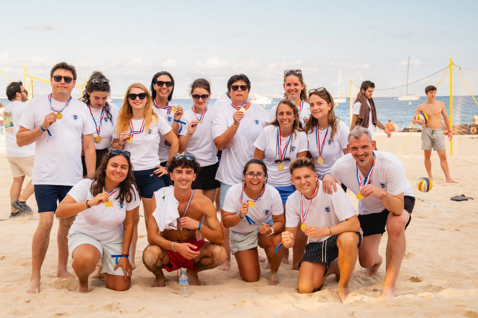 Team celebration on the beach during company offsite in Mallorca