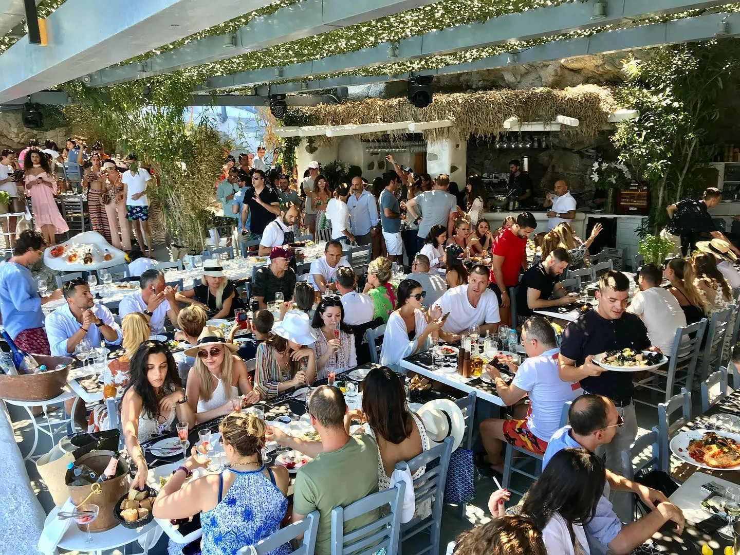 Team celebrating in a restaurant in Mykonos