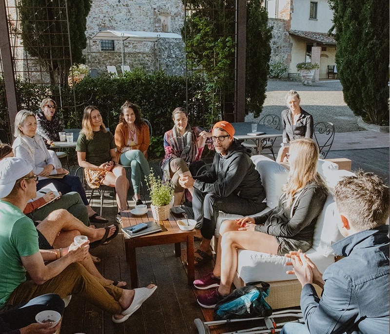 Team having an informal meeting at the company offsite in Italy
