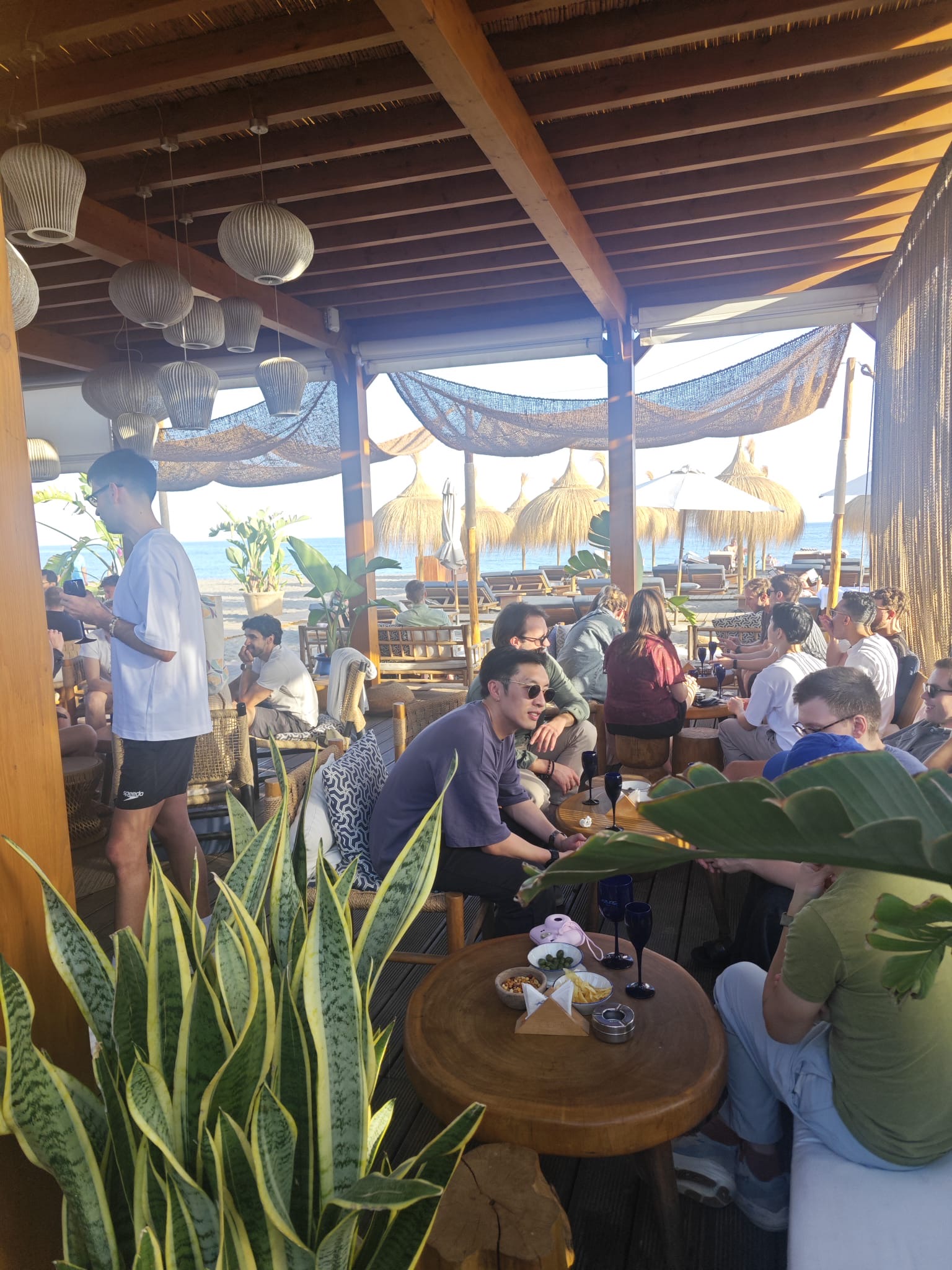 Team relaxing together during downtime at a corporate retreat