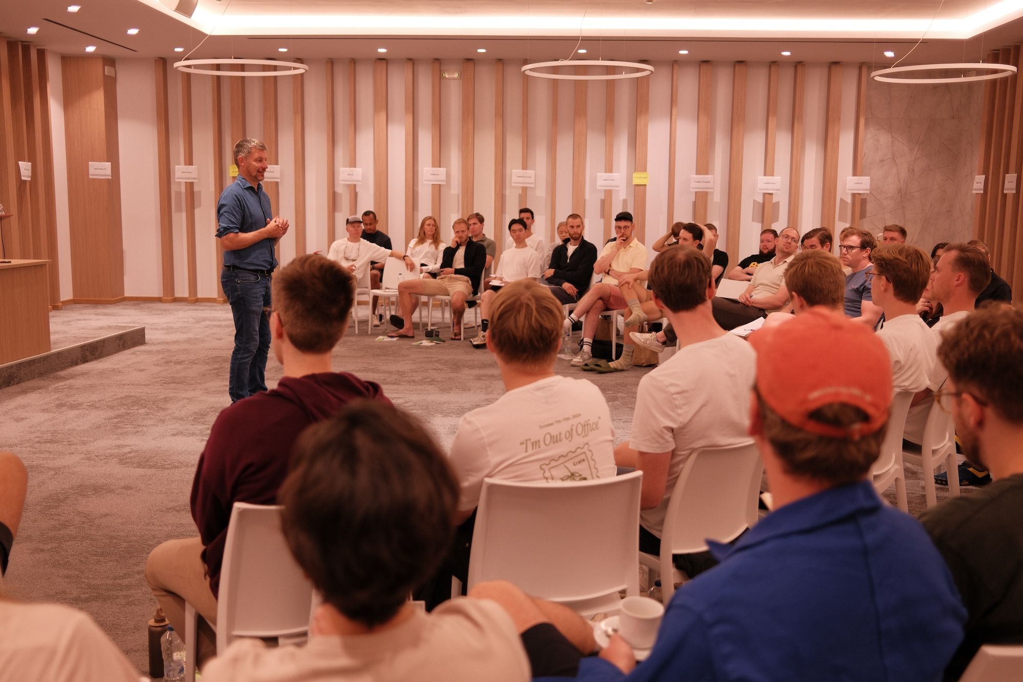 Group session during a corporate retreat with participants gathered for a workshop