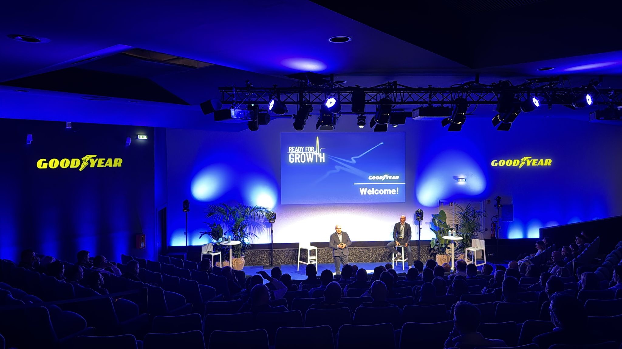 Plenary session setup at a corporate retreat with a stylish meeting space