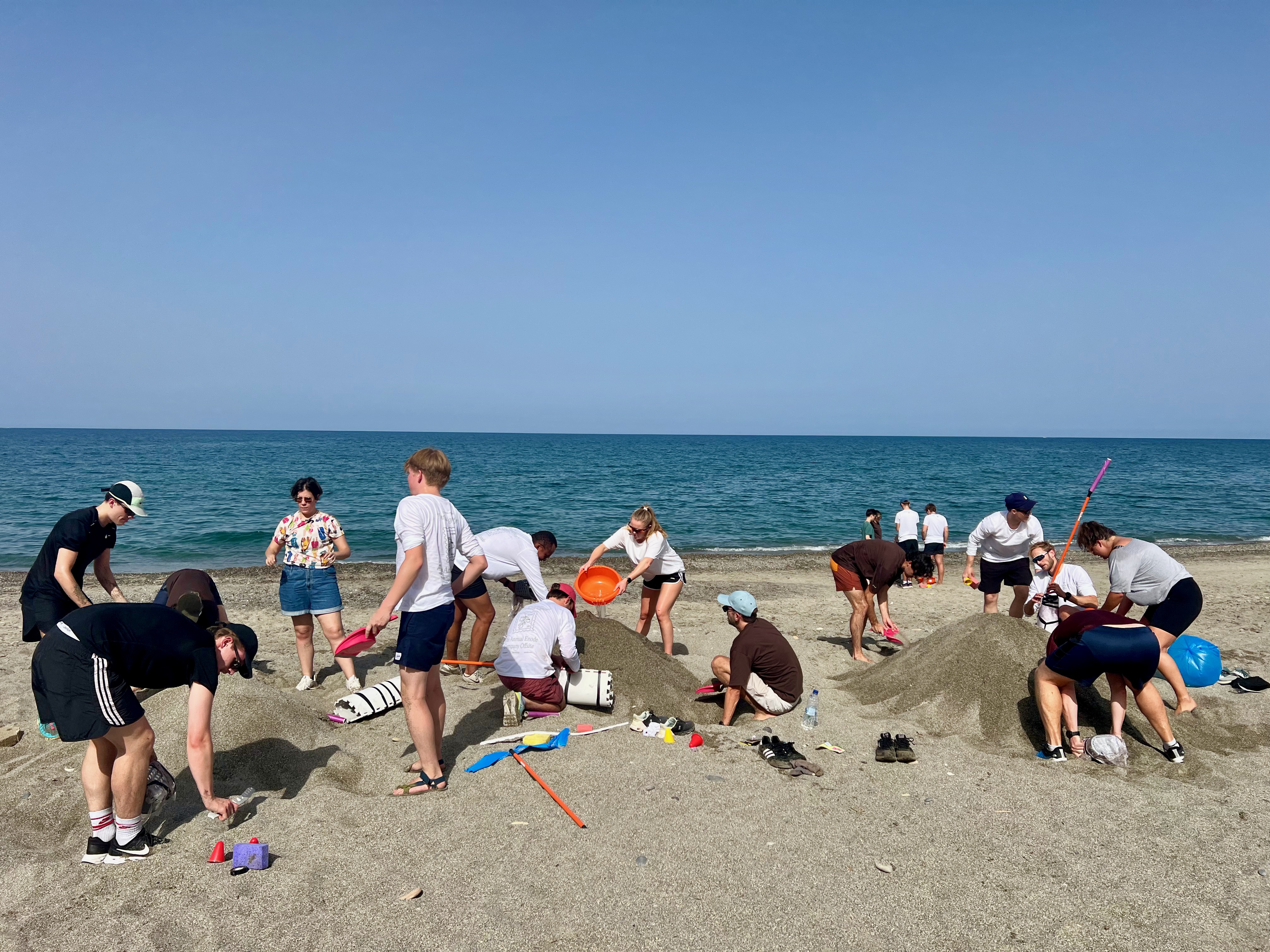 Beach Olympics team-building games during a corporate retreat by the sea