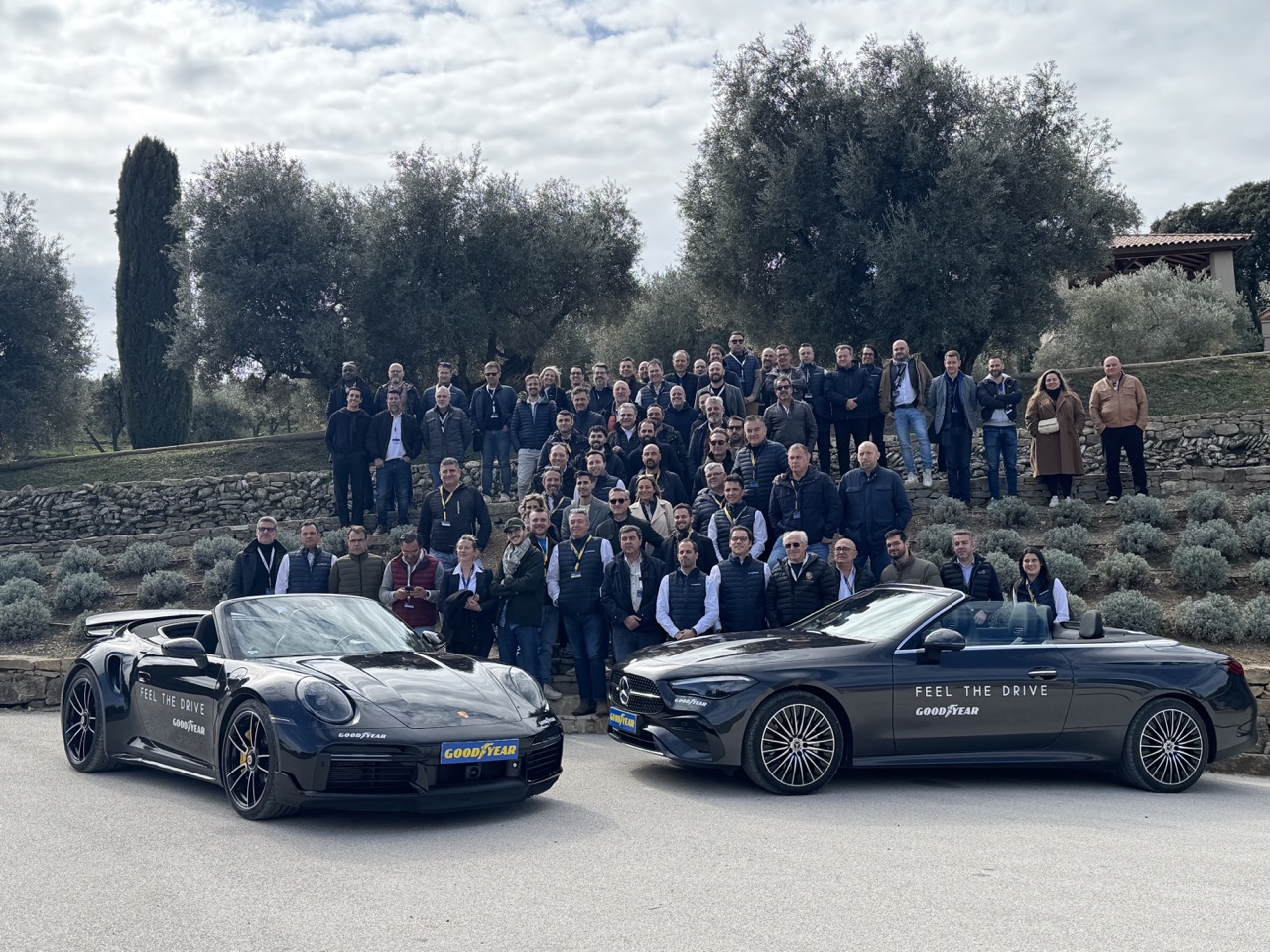 Group photo at the end of a corporate retreat, team saying farewell after the event