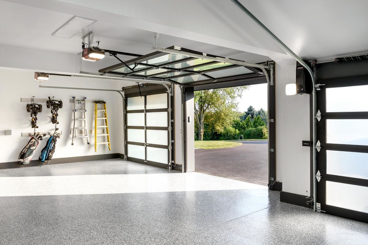Finished garage floor coating in a clean, spacious garage
