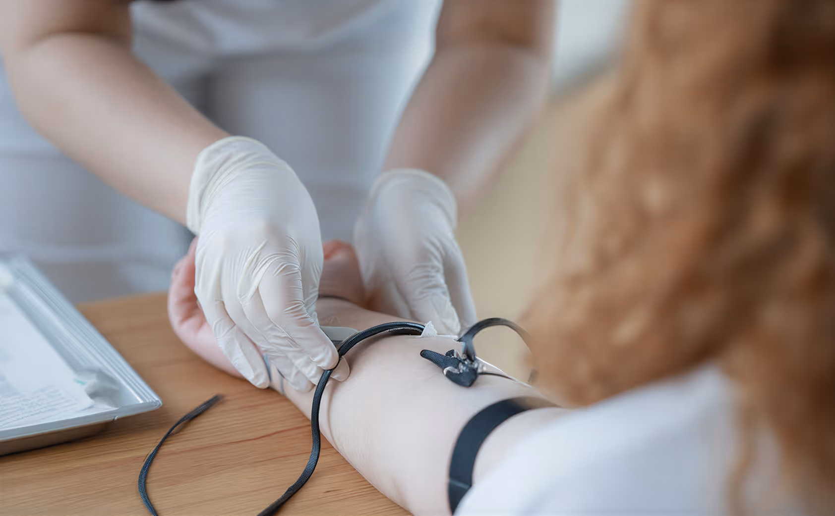 Medical professional preparing blood draw