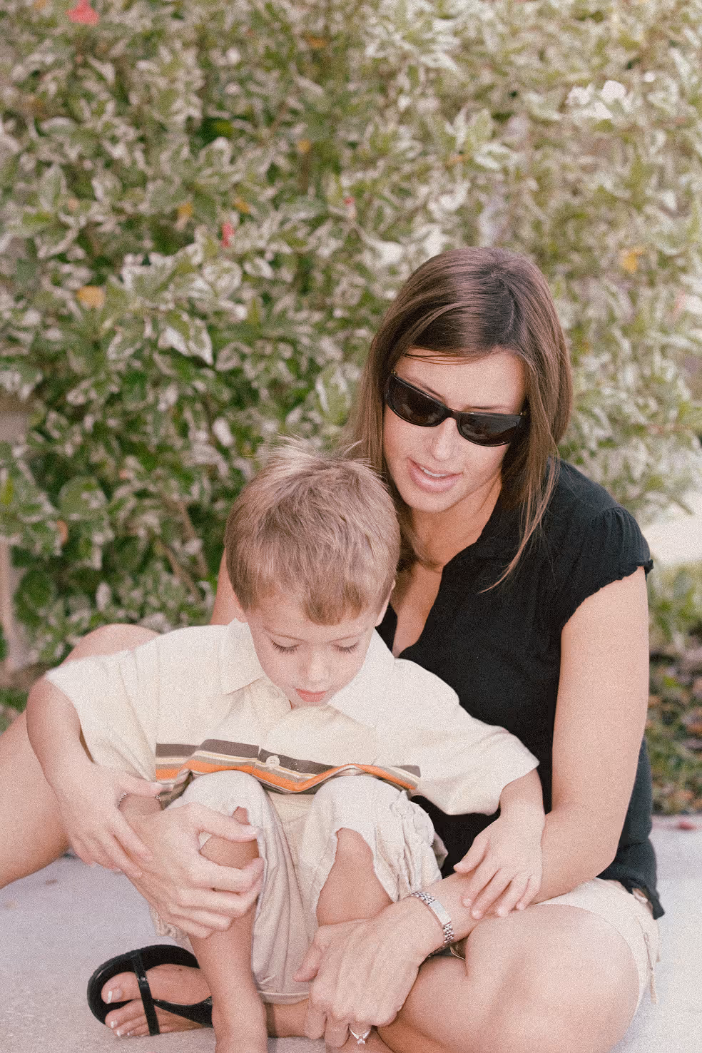 Young mother celebrating baby son's first birthday