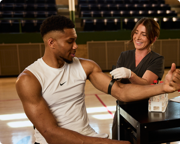 Member completing a lab blood draw