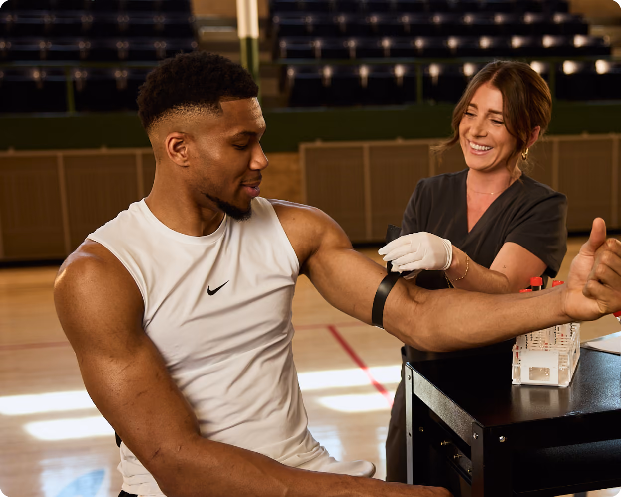 Member completing a lab blood draw