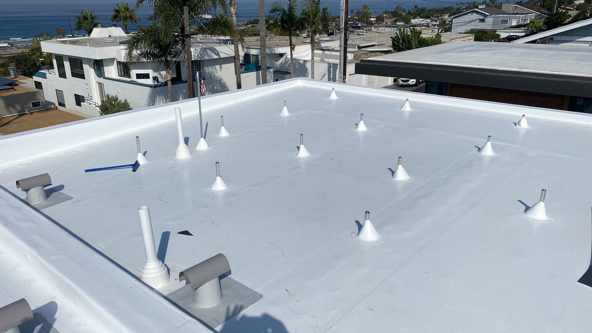 White TPO flat roof installation in Encinitas
