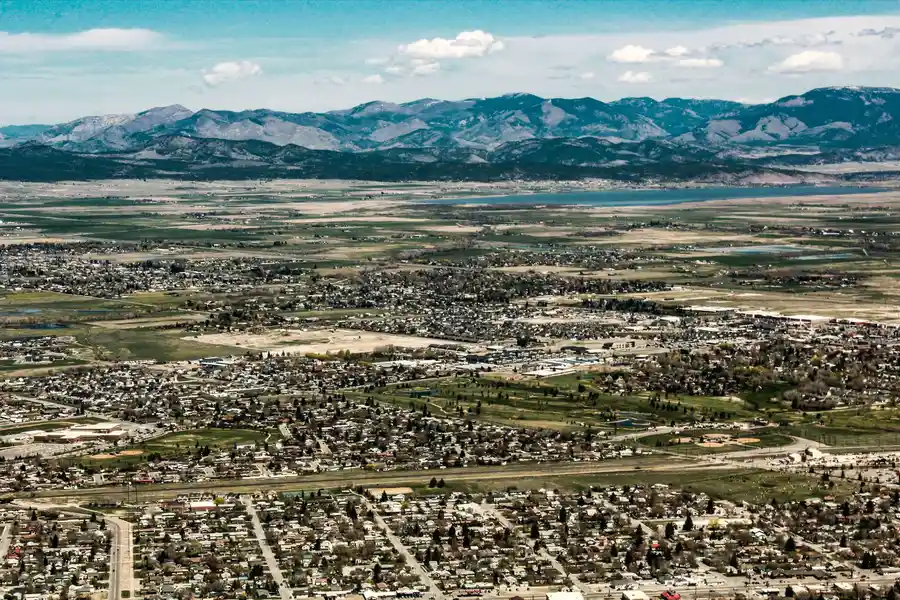 Aerial view of Helena, Montana, with mountains in the distance