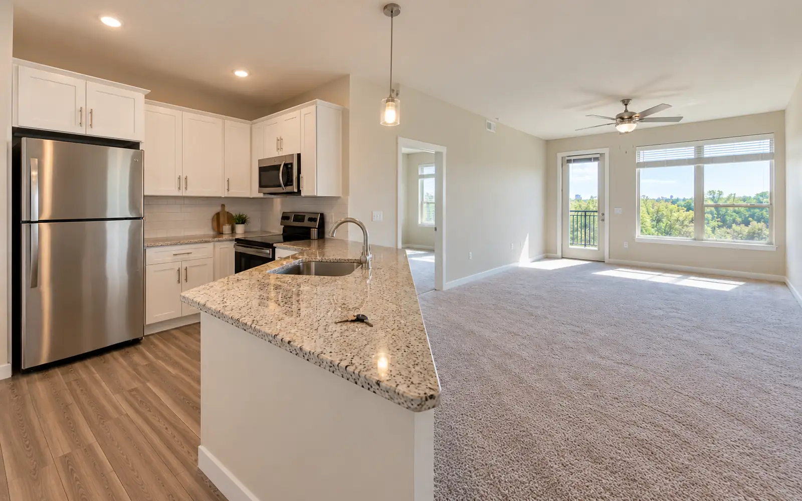 Newly installed refrigerator and carpet in a vacant rental unit ready to be placed in service