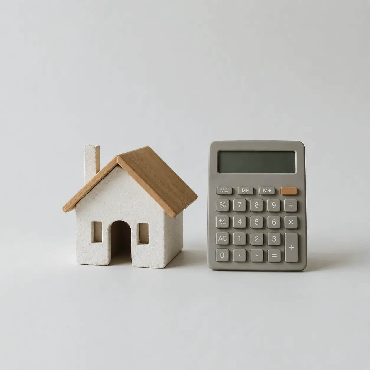 Icon of house and calculator