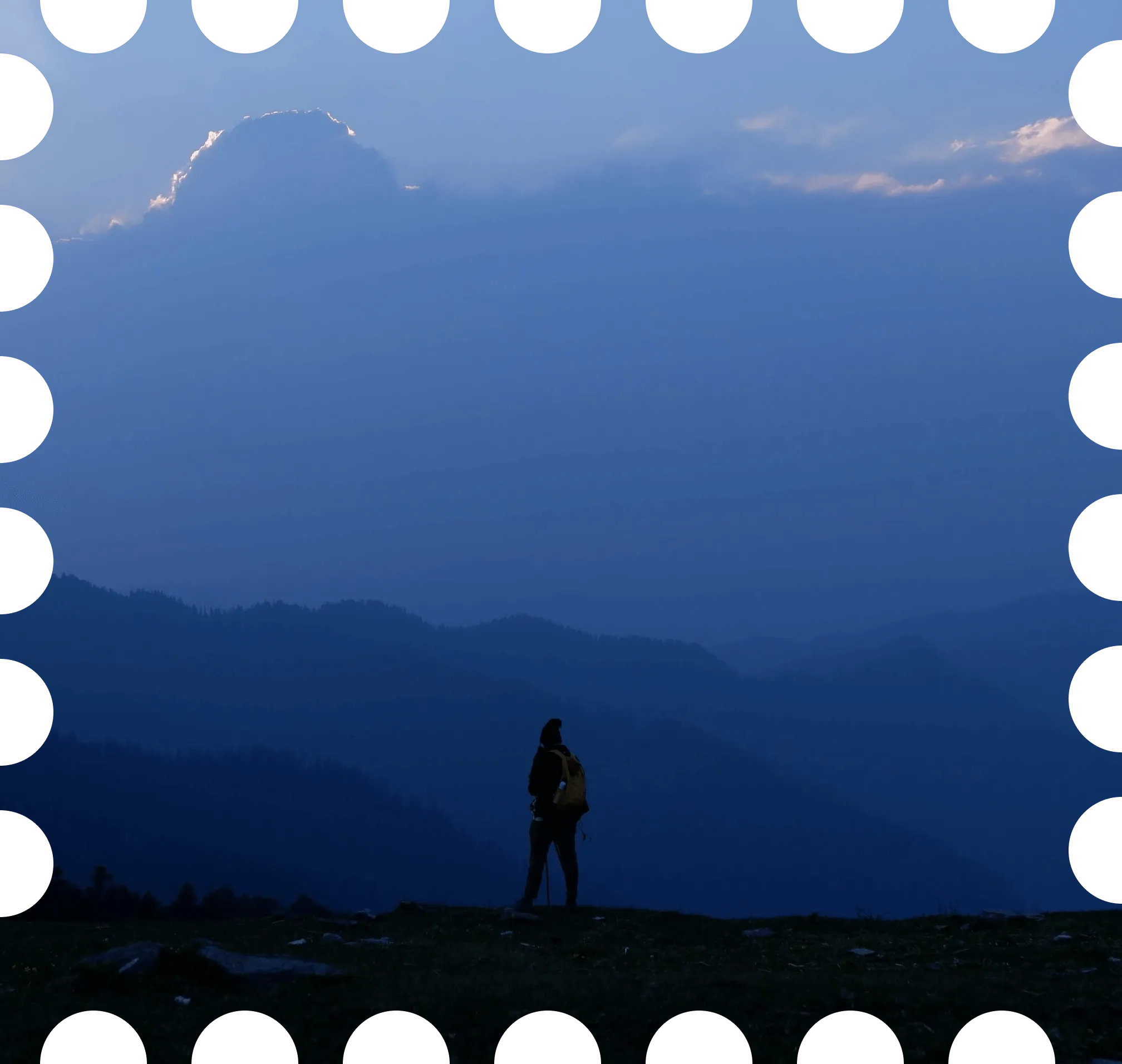 Ashwin standing on a peak
