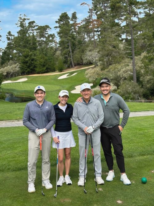 A photo of Pauline, her brothers, and dad at Spyglass Hill golf course.