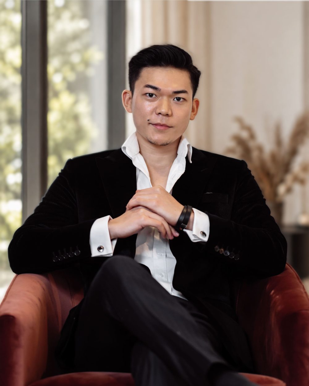 Portrait of Deejai Riangkrul, founder and creative director of VOLANTT