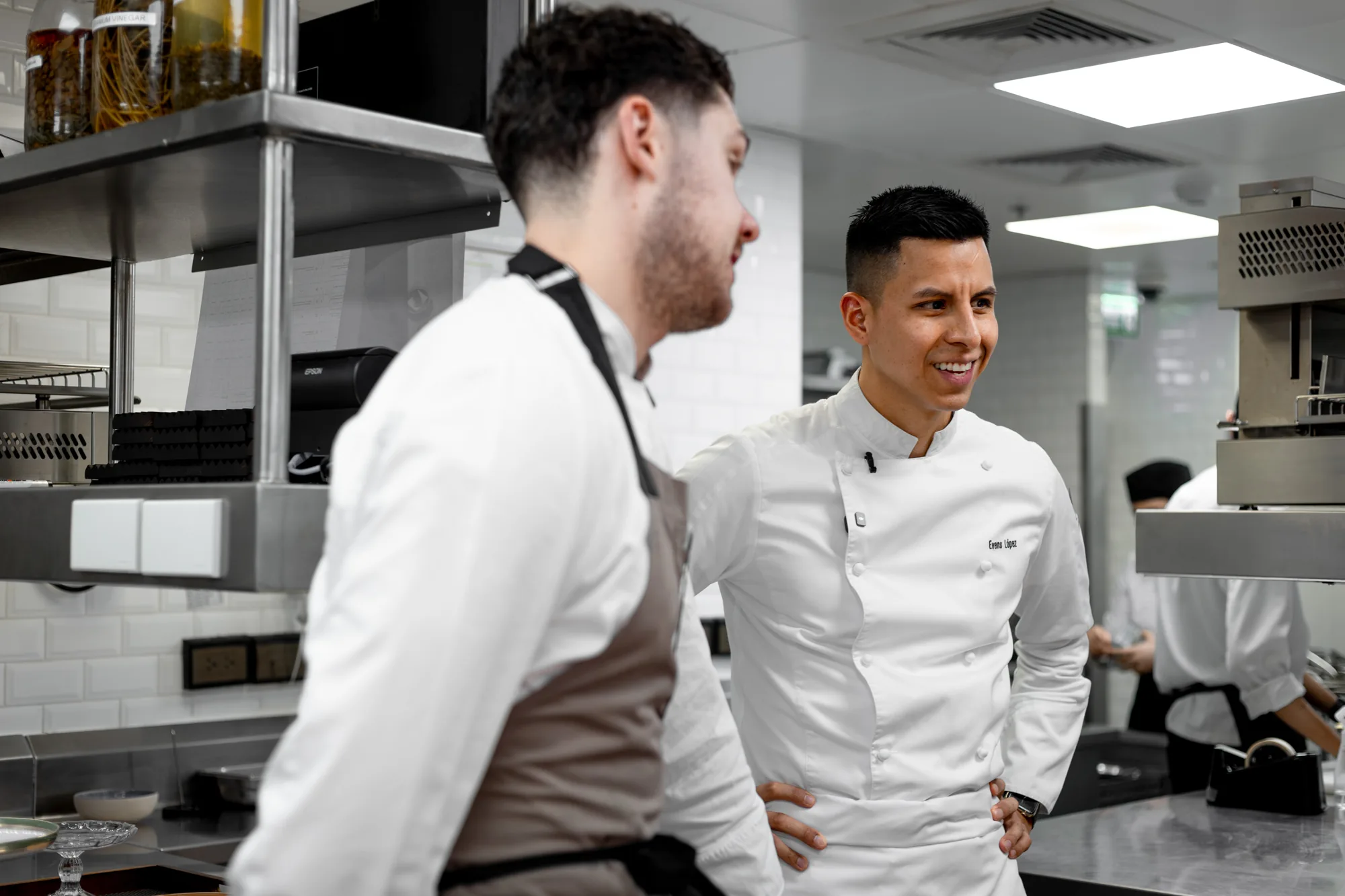 BLUE chefs sharing a moment in the kitchen.