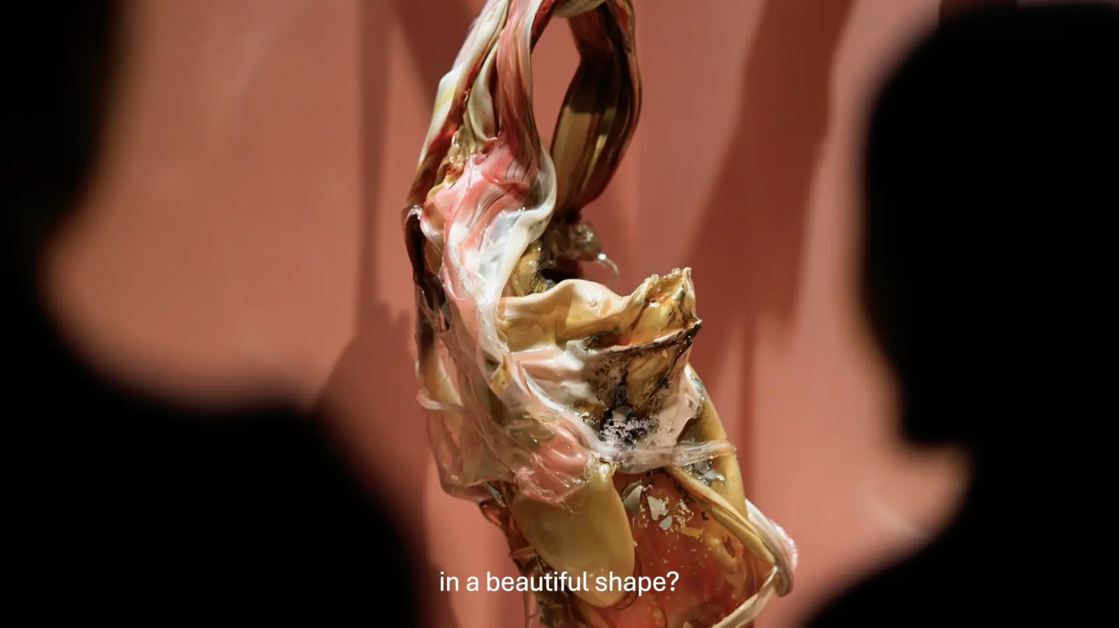 Faun’s Flesh by Maria Koshenkova, a hand-formed glass sculpture on a rose wall