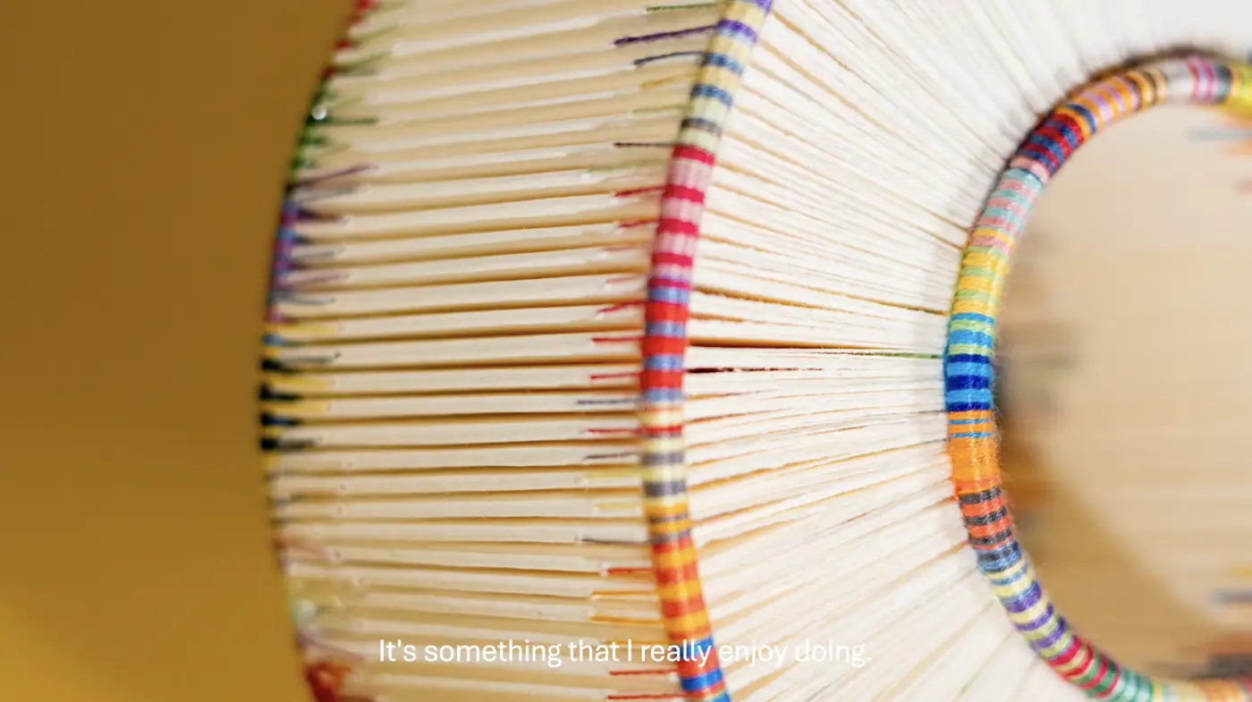Hand-wrapped coloured thread binding of Endless by Adelene Koh