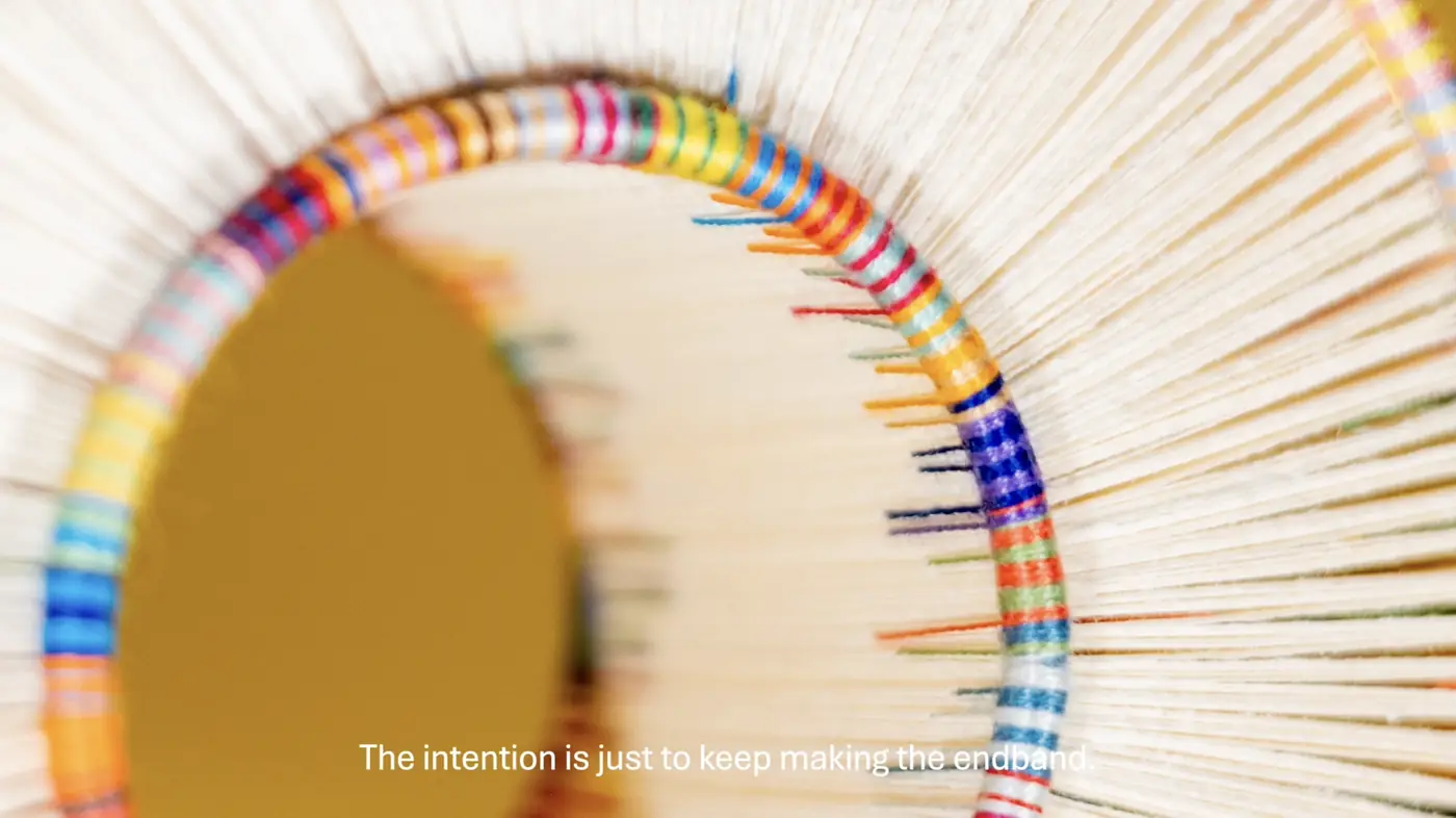 Close detail of wrapped thread at the end band of Endless by Adelene Koh