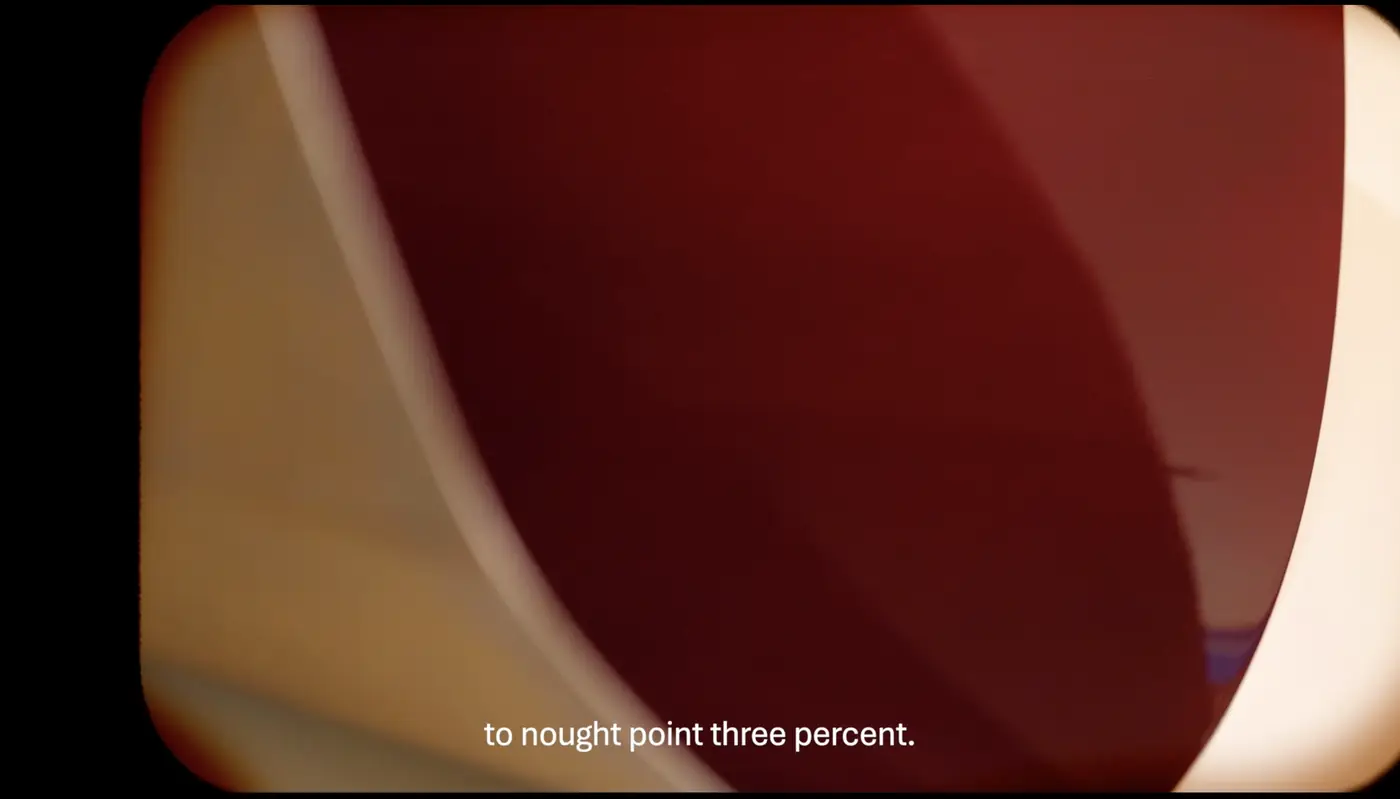 Maroon frame inside a film border from Laying Vessel by Jobe Burns