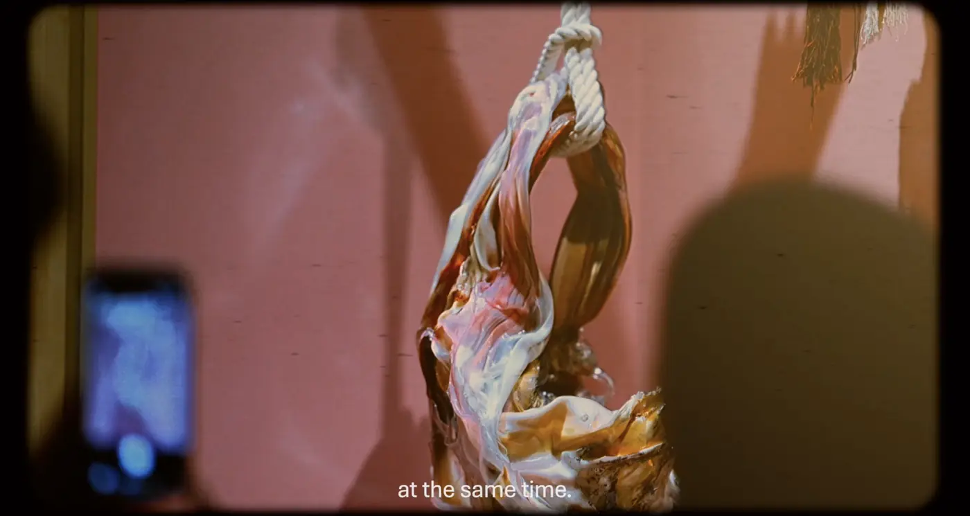 Faun’s Flesh suspended from rope, a film still from The Between