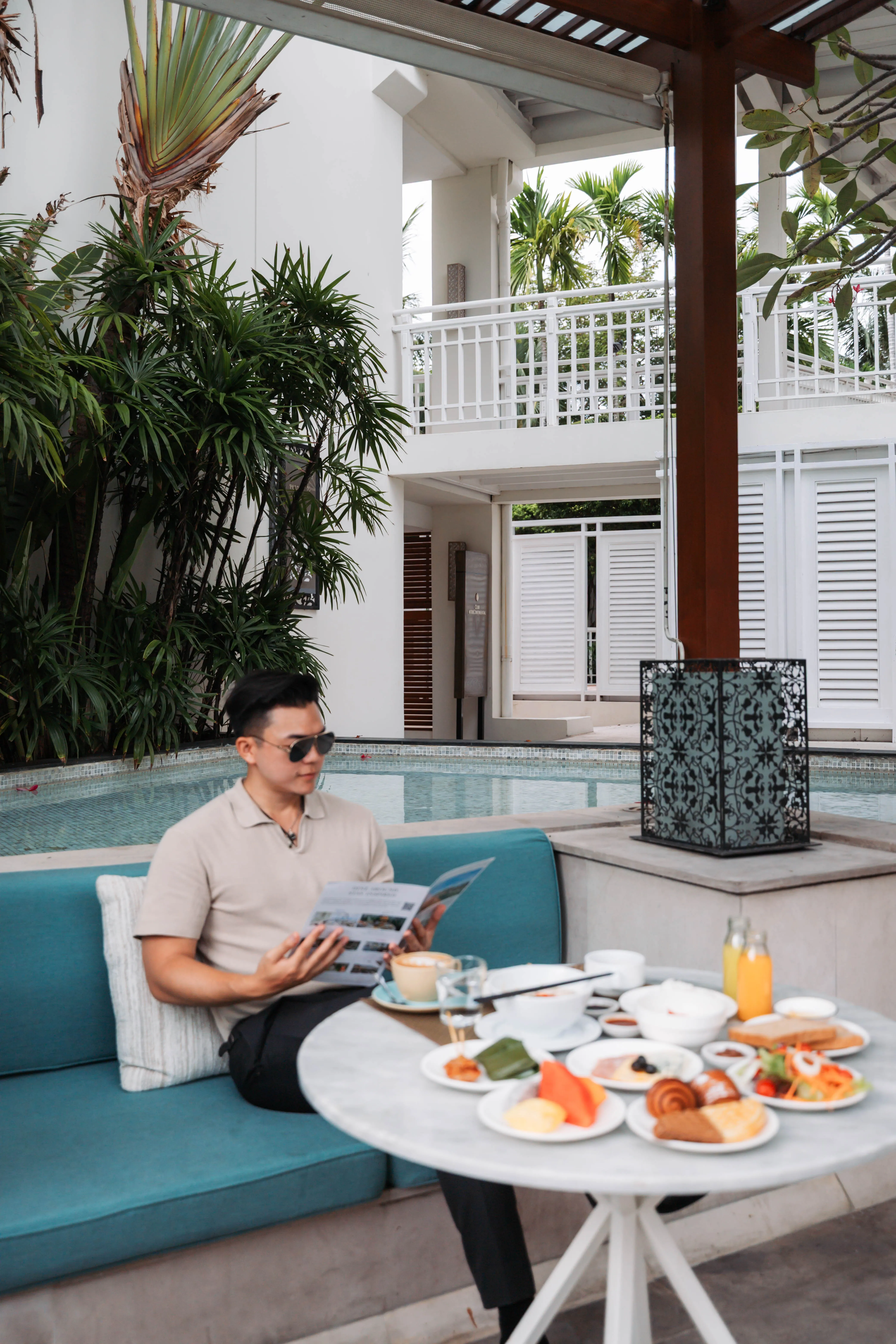 A slow breakfast beside the villa pool
