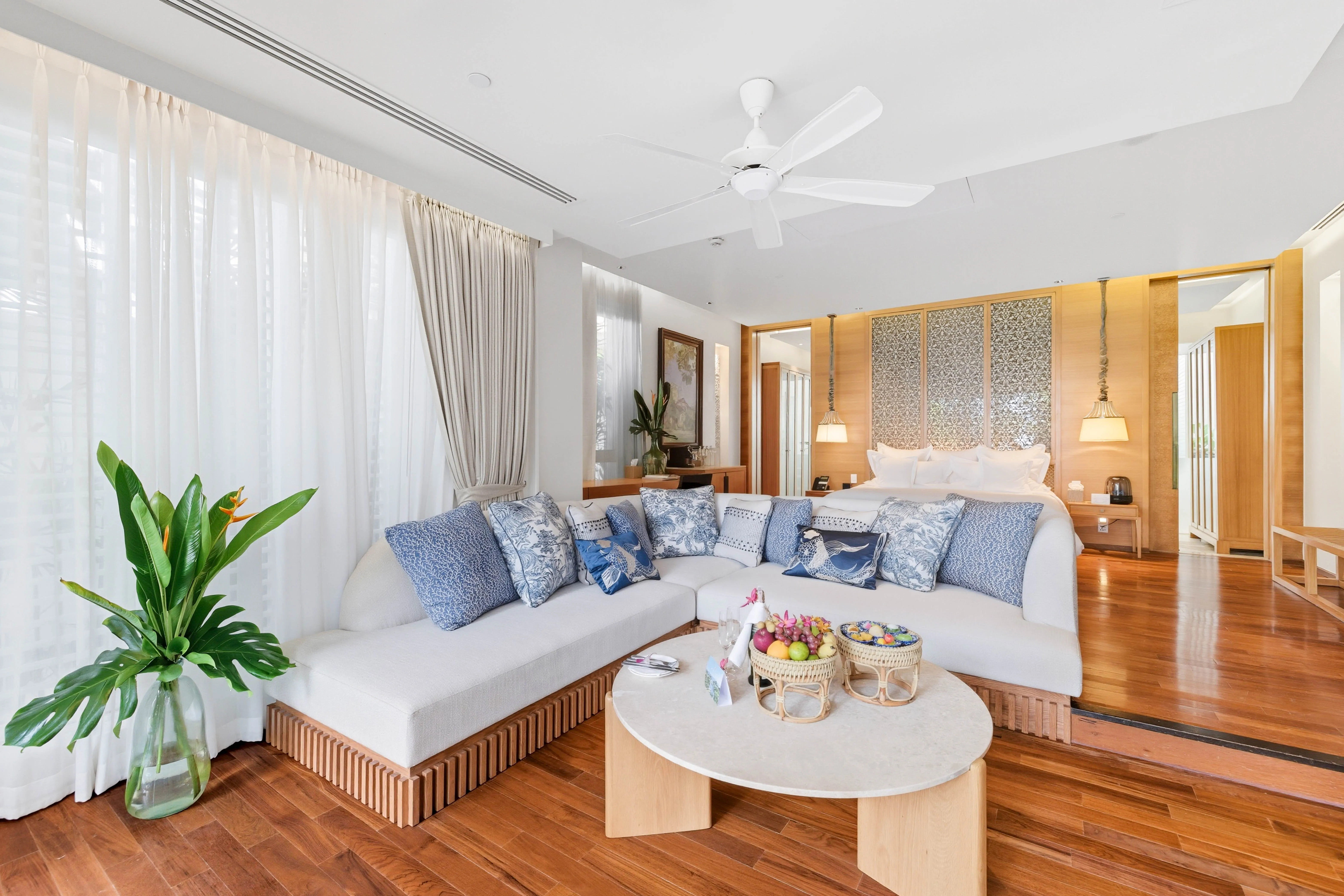 Living area of the beachfront villa with blue and white cushions