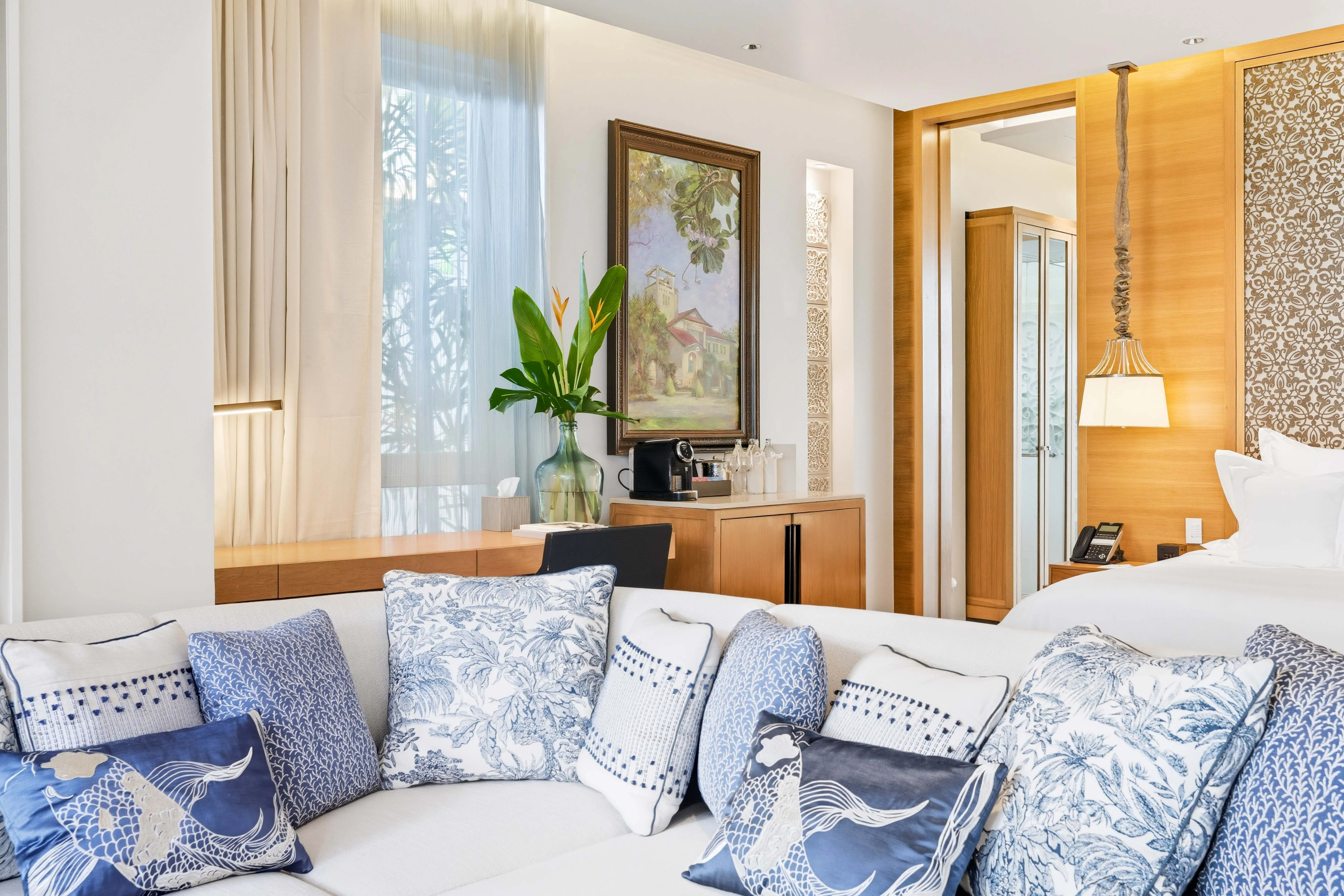 Villa living area with blue and white cushions