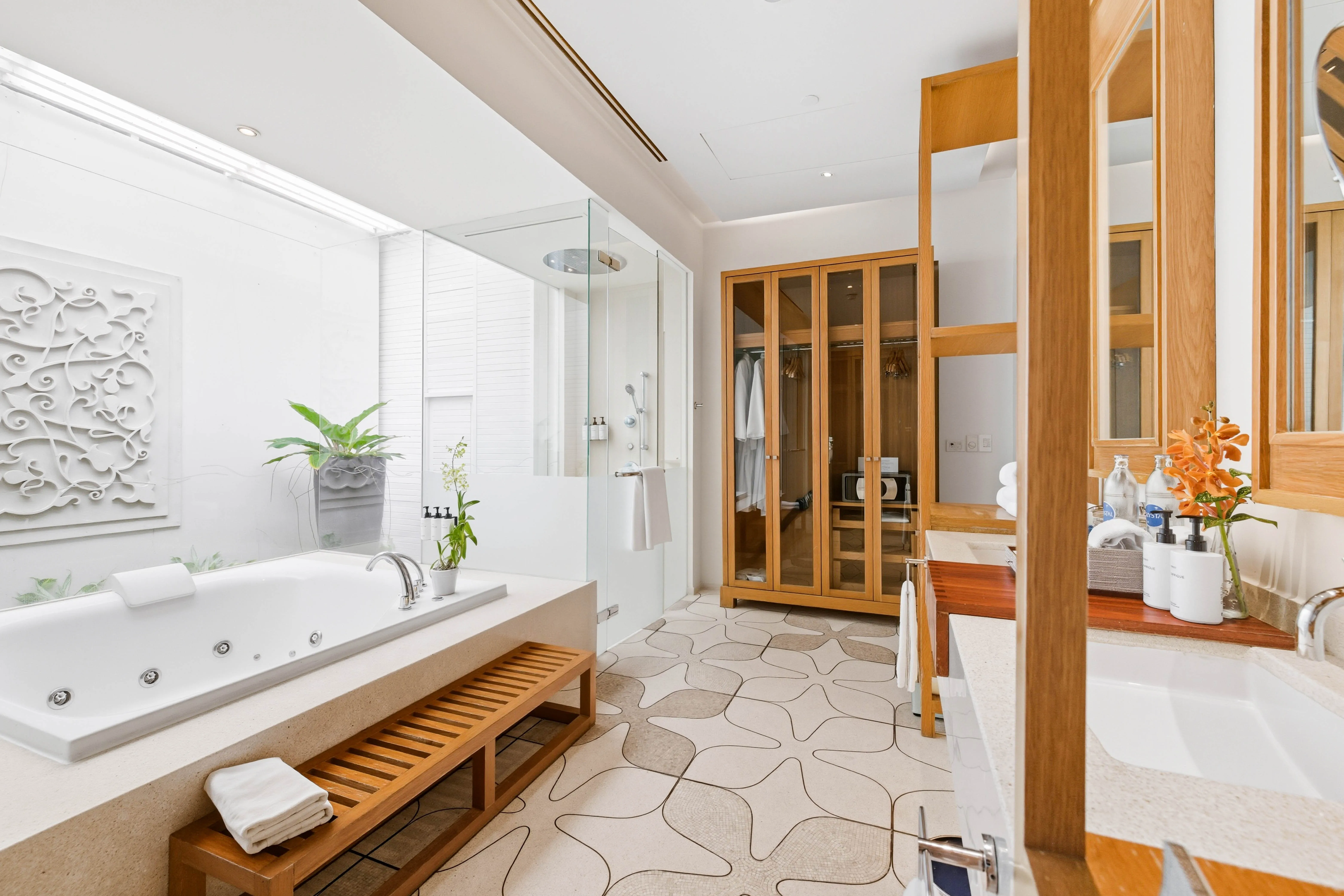 Villa bathroom with soaking tub and timber details