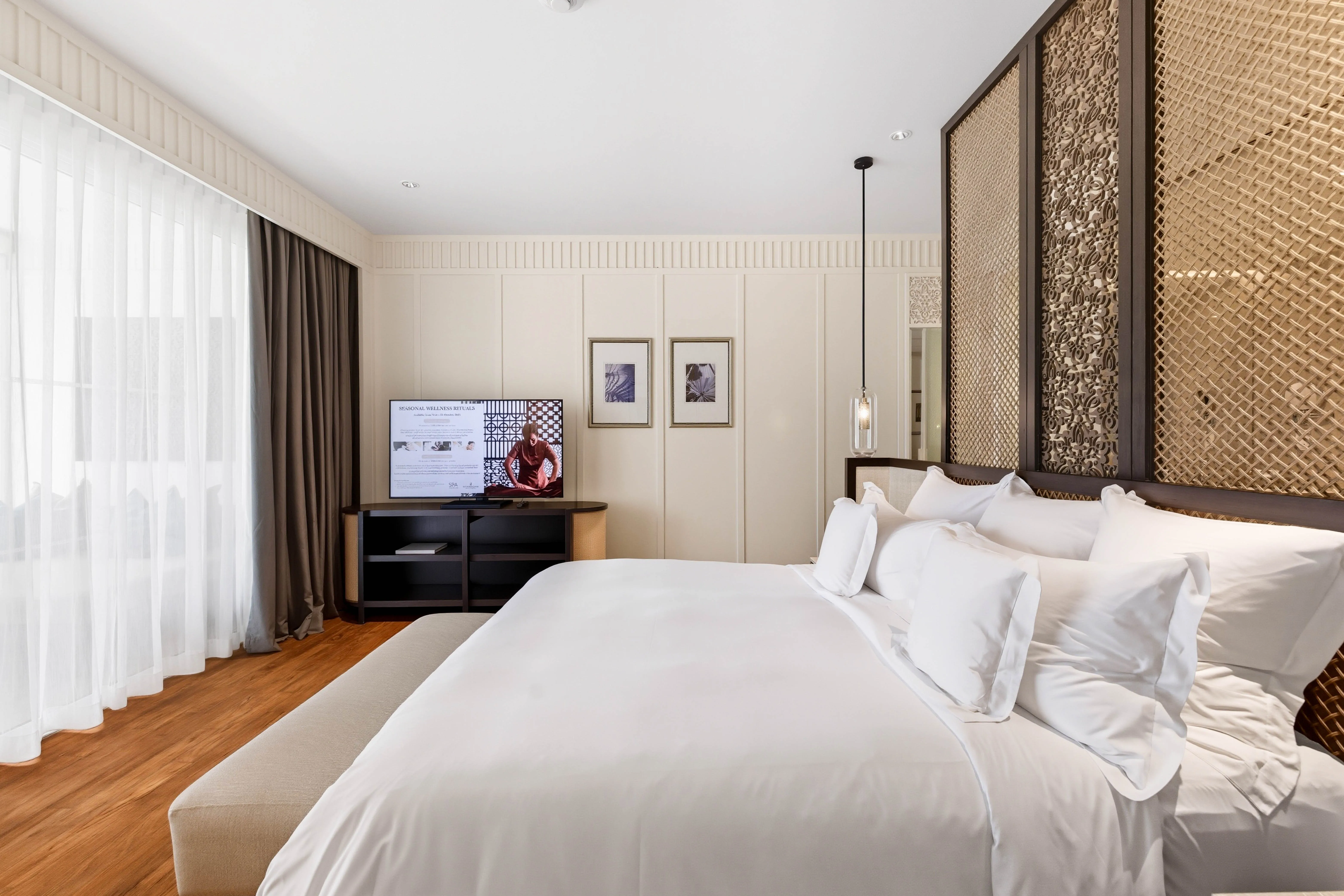 Villa bedroom with carved timber screen