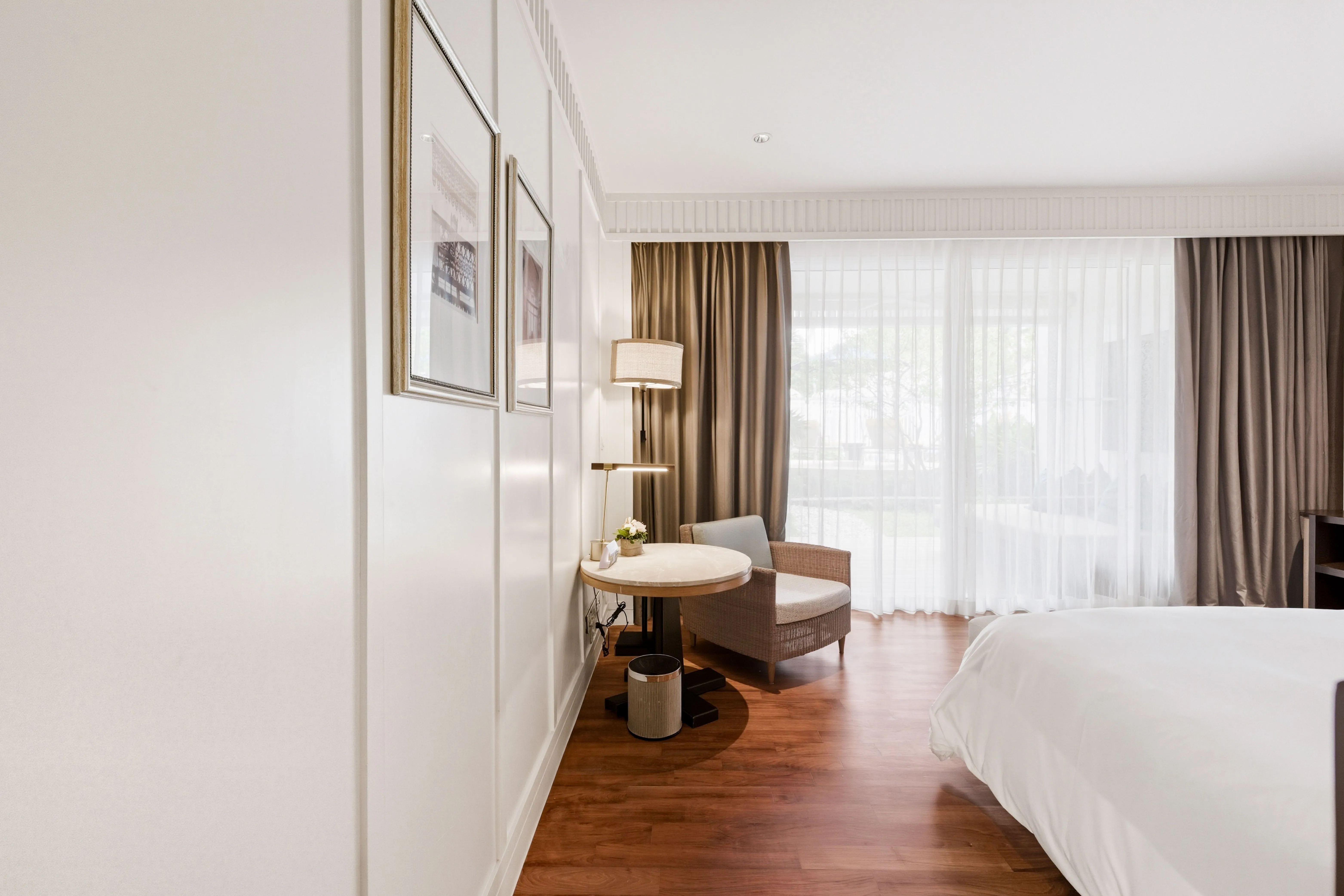 Villa bedroom with garden-facing windows