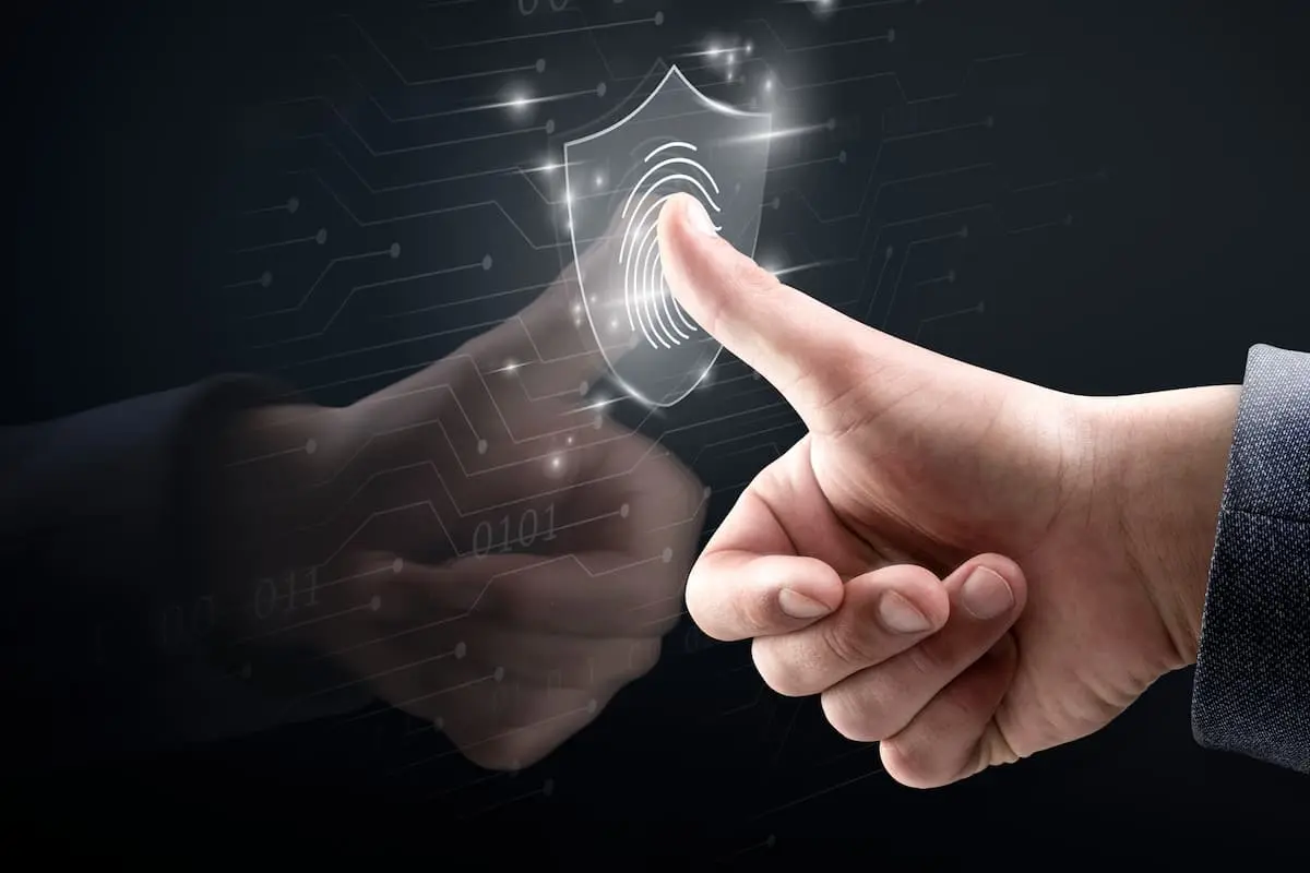 A man touching the screen with his thumb