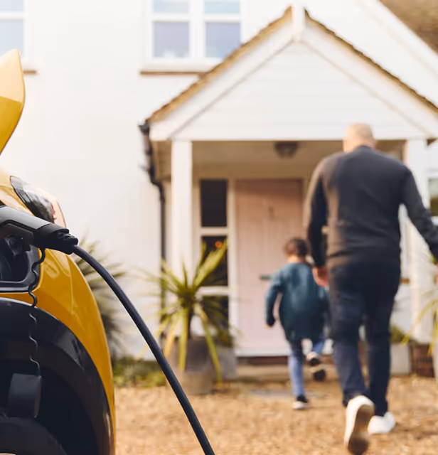 people walking into their house while the car is charging