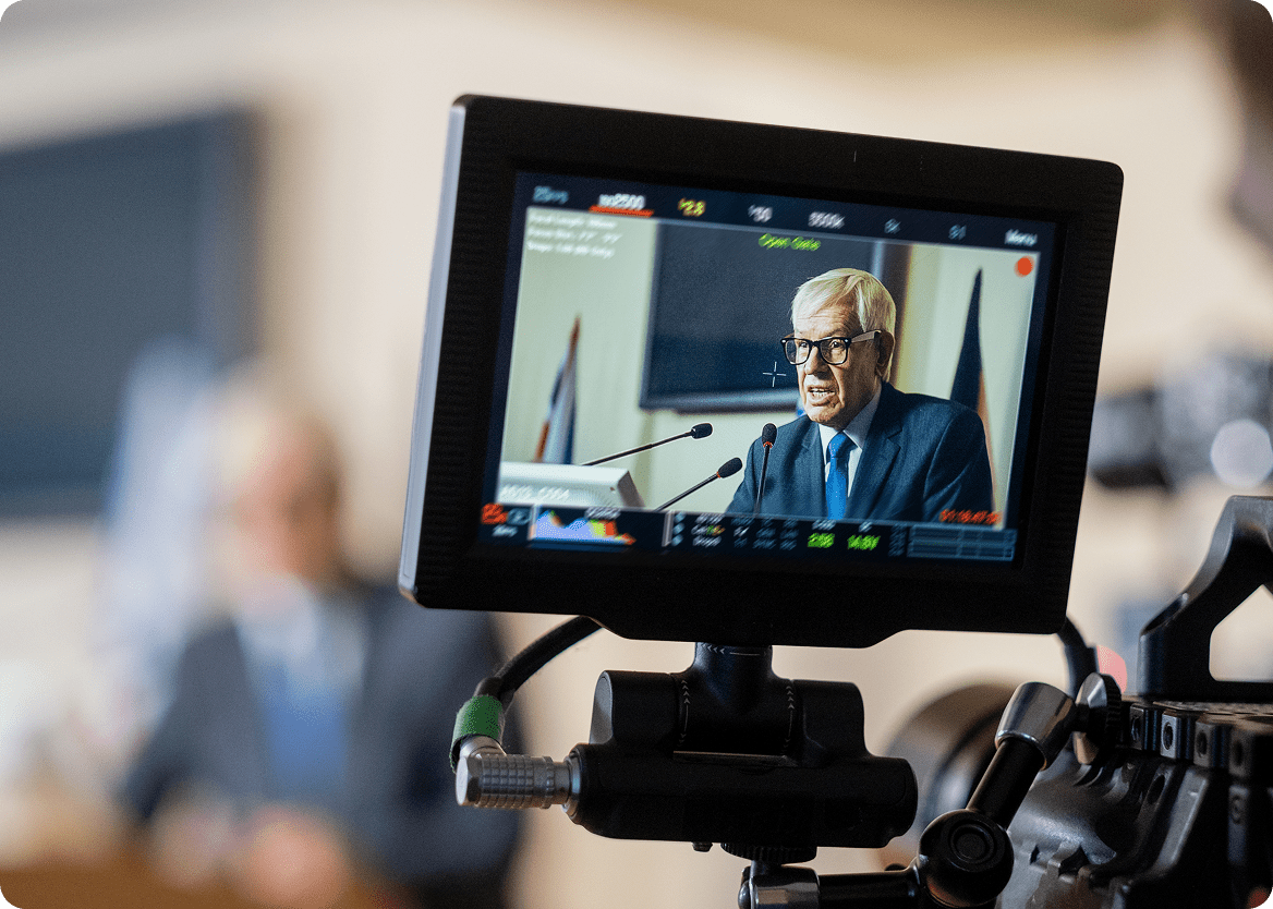 Preview of a camera being used in political conference.