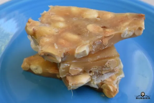 peanut brittle stacked on plate