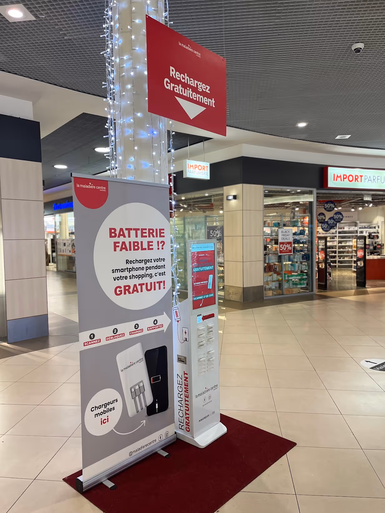 Borne batteries portatives dans un centre commercial